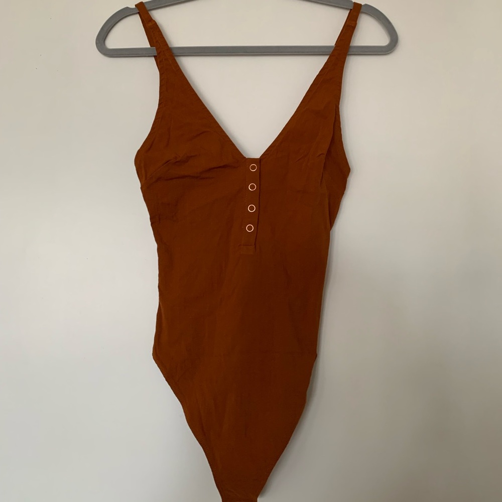 Free People body suit WITH TAGS